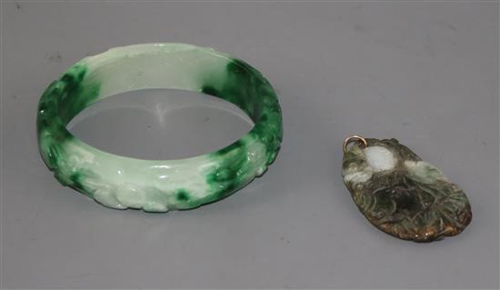 Jade bangles and a jade pendant